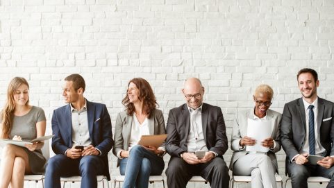 Diverse professionals seated together photo